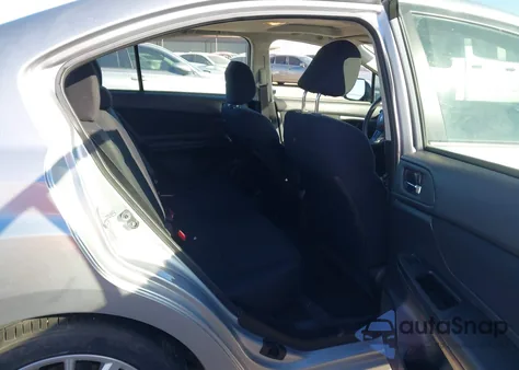 2012 Subaru Impreza 2.0I Premium z USA, uszkodzony, nr VIN JF1GJAD68CH008035